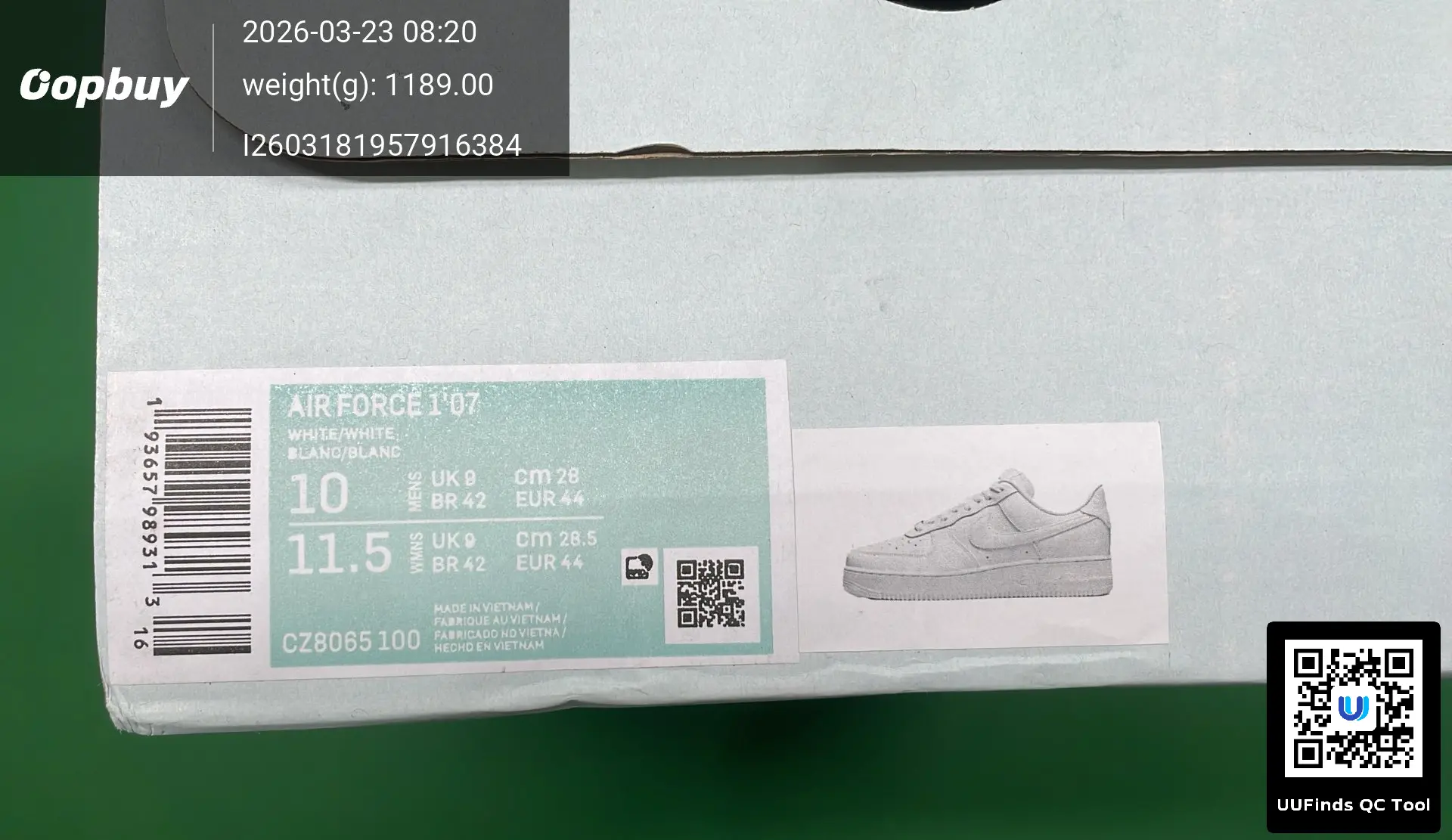 White sneaker warehouse QC inspection on a measurement mat