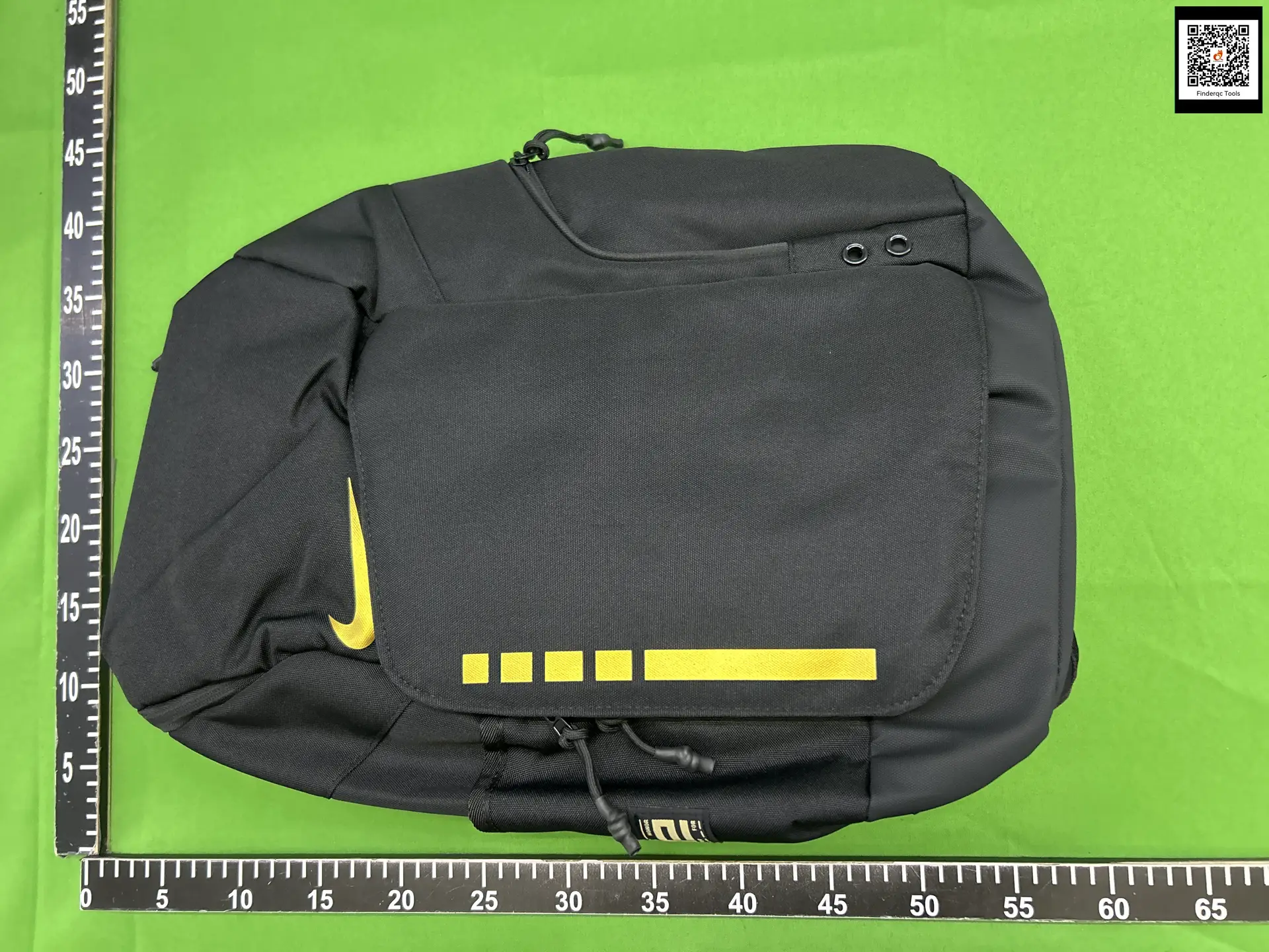 Black backpack warehouse QC inspection